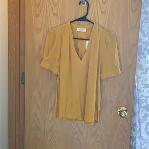 Mustard colored blouse